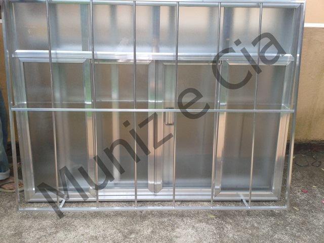 ESQUADRIA DE ALUMINIO E VIDRACARIA NO RETIRO EM PETROPOLIS RJ